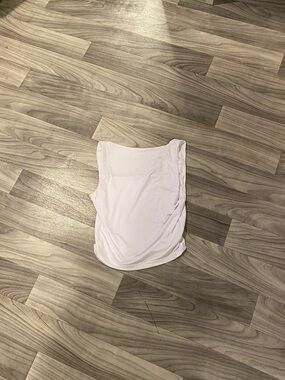 Woman’s white crop top with tank top sleeve size medium